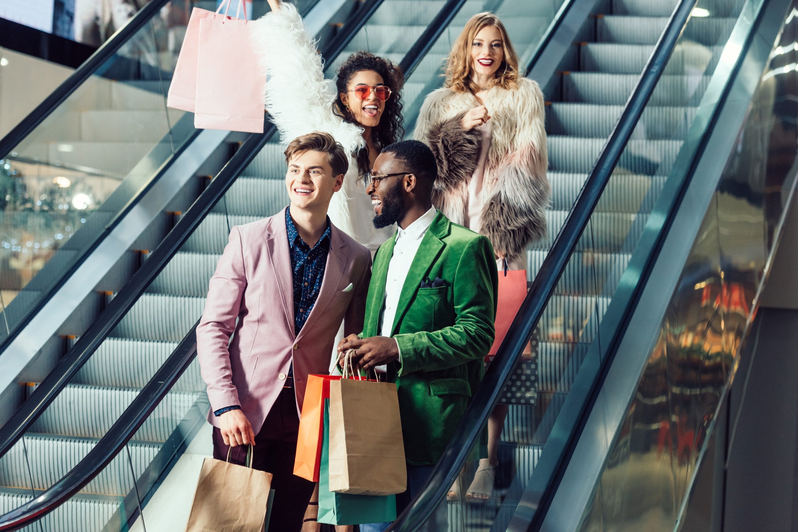group of multiethnic shoppers who learn Romanian shopping vocabulary and then walk to the mall and take many packages