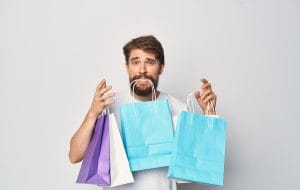 Romanian shopping vocabulary and see this bearded man in white t-shirt with packages in hands